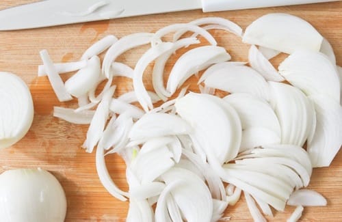 Julienned onion, ready to be sauteed in the pot.