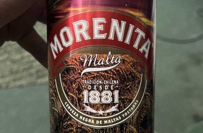 A can of Malta Morenita, the sweet dark malt drink traditionally used for this cocktail.