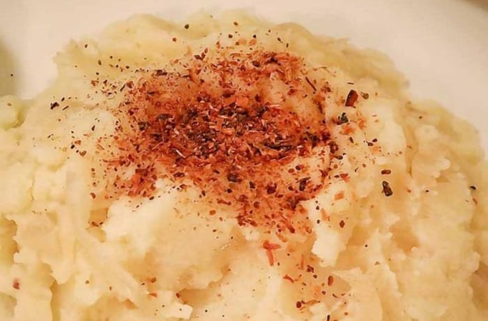 Mapuche mayu poñi, a rustic potato mash with sautéed onion and a pinch of smoked merken