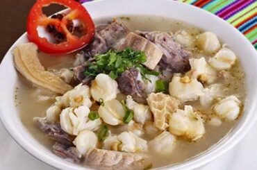 Peruvian caldo de mote, a hearty hominy and mutton soup with potatoes
