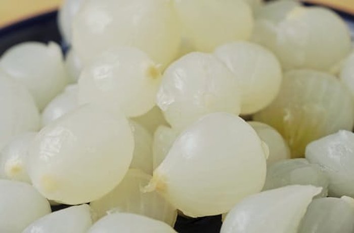 Pickled pearl onions, a tangy, crunchy ingredient for Chilean American sauce.