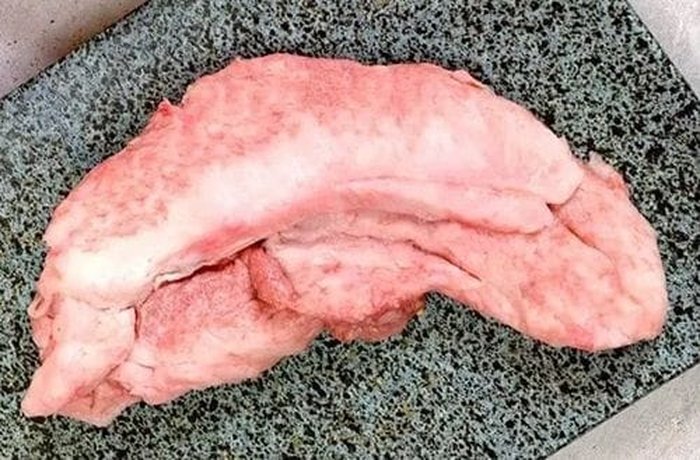Whole raw beef udder from the butcher, cleaned and ready for brining