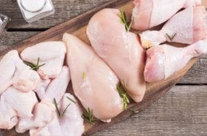 Fresh chicken pieces ready to be browned in the pot for the cazuela nogada