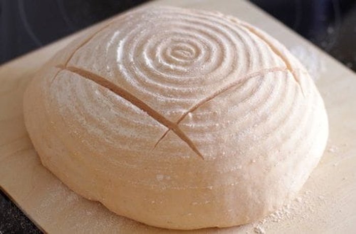 Shaped and scored sourdough loaf