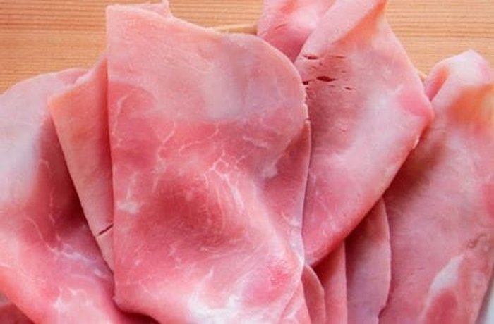 Slices of cooked ham for the rolls