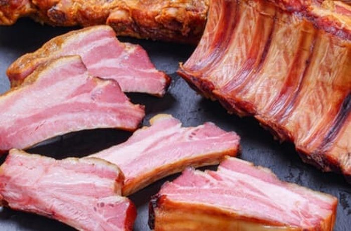 Smoked pork ribs cut into pieces for the cazuela