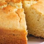 Sliced vegan loaf cake made with almond milk and coconut oil