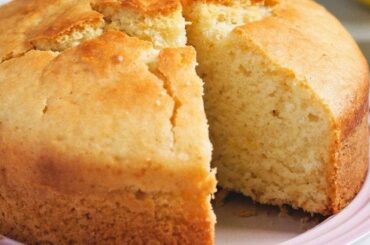 Sliced vegan loaf cake made with almond milk and coconut oil
