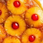 Venezuelan torta de pina, a pineapple upside-down cake with caramel and cherries