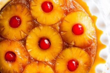 Venezuelan torta de pina, a pineapple upside-down cake with caramel and cherries