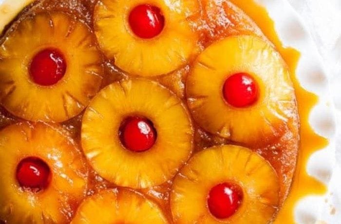 Venezuelan torta de pina, a pineapple upside-down cake with caramel and cherries