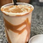 Venezuelan chicha criolla, a creamy rice drink served cold with ice and cinnamon