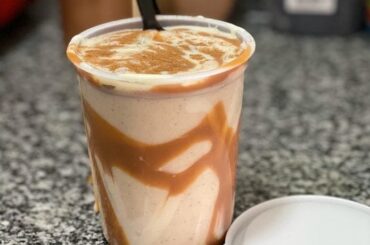 Venezuelan chicha criolla, a creamy rice drink served cold with ice and cinnamon