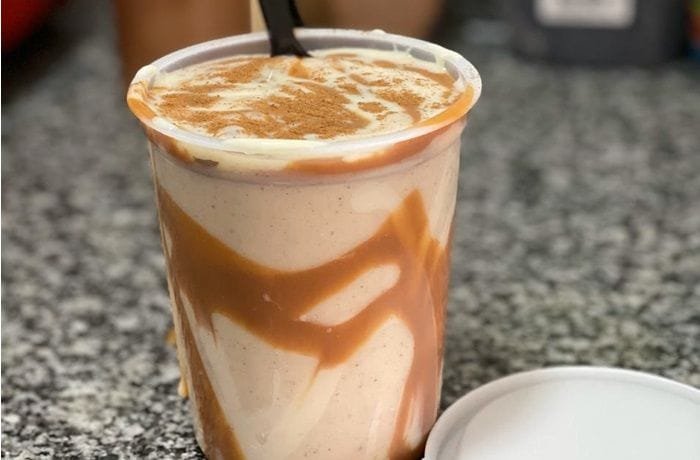 Venezuelan chicha criolla, a creamy rice drink served cold with ice and cinnamon