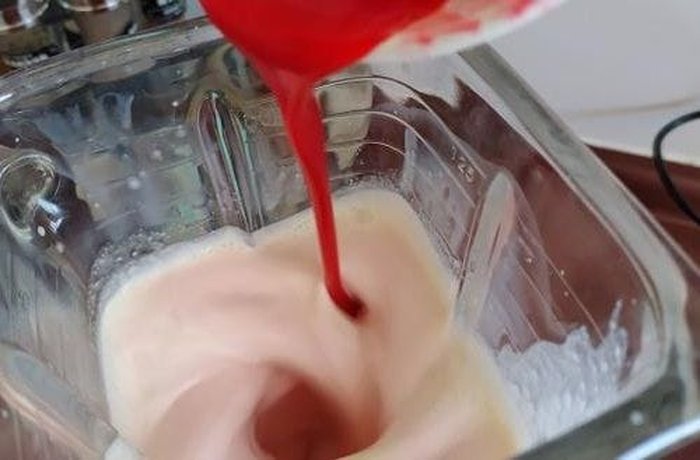 Whipped evaporated milk and strawberry gelatin mixture