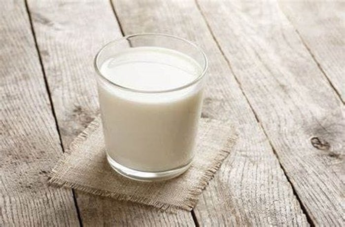 Whole milk ready to be heated with butter for the mashed potatoes
