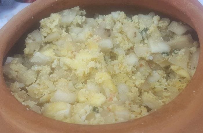 Andean chuño with eggs and fresh cheese, sprinkled with parsley