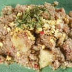 Andean quinoa lawa, a thick quinoa and potato stew with hard boiled eggs and parsley