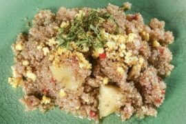 Andean quinoa lawa, a thick quinoa and potato stew with hard boiled eggs and parsley