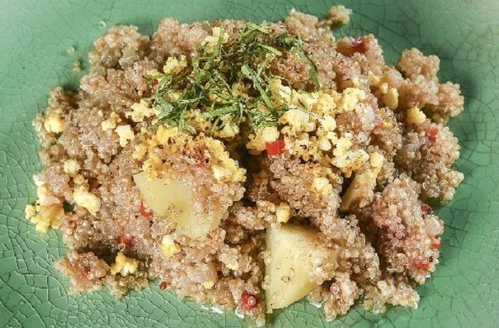 Andean quinoa lawa, a thick quinoa and potato stew with hard boiled eggs and parsley