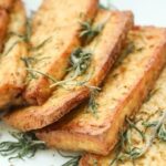 Asian style marinated tofu with scallions and sesame seeds