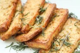 Asian style marinated tofu with scallions and sesame seeds