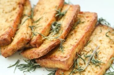 Asian style marinated tofu with scallions and sesame seeds