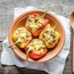 Baked bell peppers stuffed with ground beef and rice