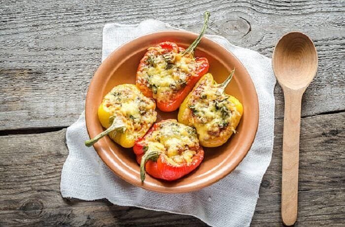 Baked bell peppers stuffed with ground beef and rice