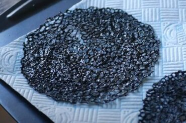 Black olive coral tuile, a lacy crisp garnish for gourmet plating
