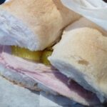 Chilean arrollado de malaya sandwich with tomato and lettuce