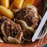 Oven baked mustard chicken with potatoes and onion