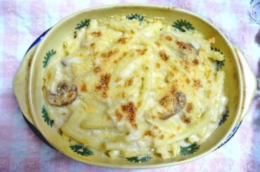 Chilean tallarines bontú, baked pasta with ham, mushrooms and golden cheese, homemade recipe