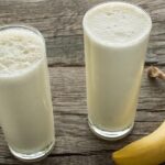Chilean banana milk, leche con plátano, served cold in tall glasses