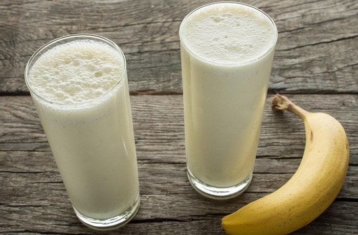 Chilean banana milk, leche con plátano, served cold in tall glasses
