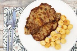 Chilean breaded beef escalopa with golden duchess potatoes