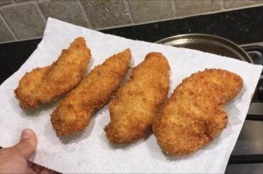 Golden breaded chicken tenders, Chilean filetitos de pollo apanado, ready to serve