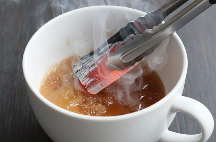 Chilean charcoal coffee, a traditional countryside digestive drink, in a cup