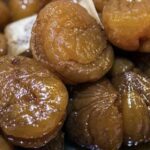 Chilean chestnuts in syrup with a cinnamon stick, a homemade autumn preserve