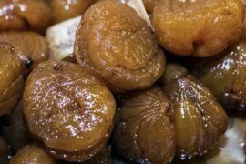 Chilean chestnuts in syrup with a cinnamon stick, a homemade autumn preserve
