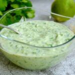Homemade cilantro yogurt sauce in a bowl