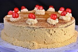 Chilean coffee cream cake dusted with cocoa