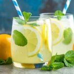Chilean homemade lemonade with ice and pica lemon slices