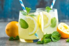 Chilean homemade lemonade with ice and pica lemon slices