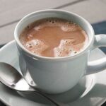 Cups of homemade Chilean hot chocolate made with milk, cocoa, and milk chocolate