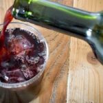 Chilean jote, red wine mixed with cola served over ice in a tall glass