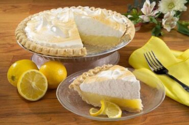 Chilean lemon pie with a shortcrust base, condensed milk lemon filling, and a golden meringue lattice