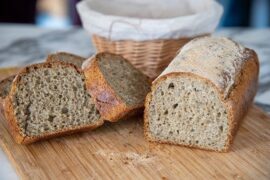 Homemade lentil bread loaf with a scored crust, made without wheat flour or eggs