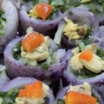 Chilean meñarki potatoes stuffed with corn, peas, and red pepper