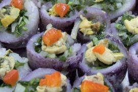 Chilean meñarki potatoes stuffed with corn, peas, and red pepper